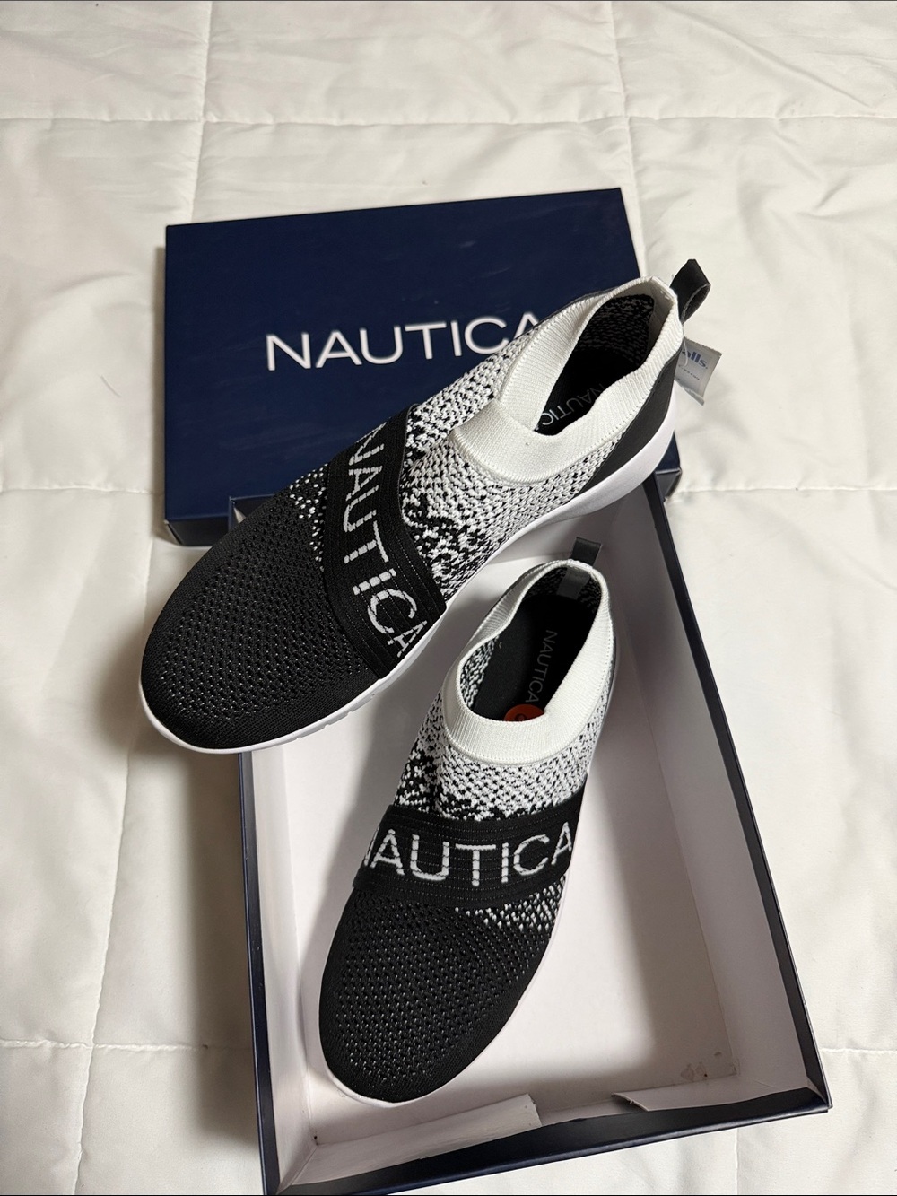 Nautica Women’s Black and White Slip-On Knit Sneakers